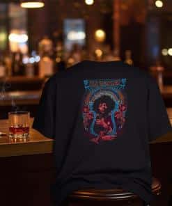 Jimi Hendrix image on a black shirt. The shirt is sitting on a bar chair.